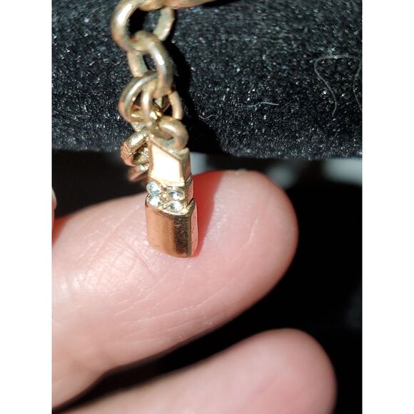 A Guess Women's Charm Bracelet Gold Tone Chain Lipstick Rhinestone - Picture 9 of 11
